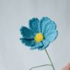Crochet Gesang Flower PDF pattern with free video tutorial, step-by-step instructions for creating a crochet flower.